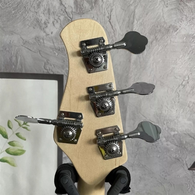 Guitarra de bajo eléctrica Stingray de 4 cuerdas en verde con pickguard blanco proveedor