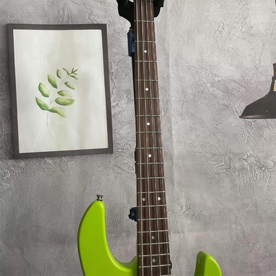 Guitarra de bajo eléctrica Stingray de 4 cuerdas en verde con pickguard blanco proveedor