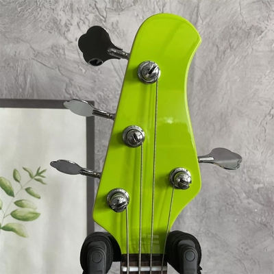 Guitarra de bajo eléctrica Stingray de 4 cuerdas en verde con pickguard blanco proveedor