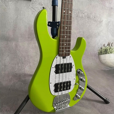 Guitarra de bajo eléctrica Stingray de 4 cuerdas en verde con pickguard blanco proveedor