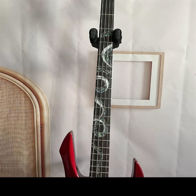Personalizado Especial Forma irregular del cuerpo Transparente Rojo Bajo Eléctrico Guitarra 4 Cuerdas Bajo Cuerpo de madera proveedor