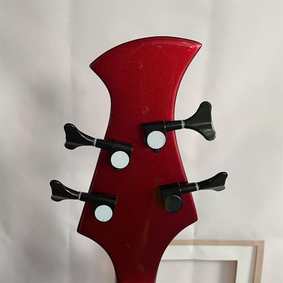 Personalizado Especial Forma irregular del cuerpo Transparente Rojo Bajo Eléctrico Guitarra 4 Cuerdas Bajo Cuerpo de madera proveedor