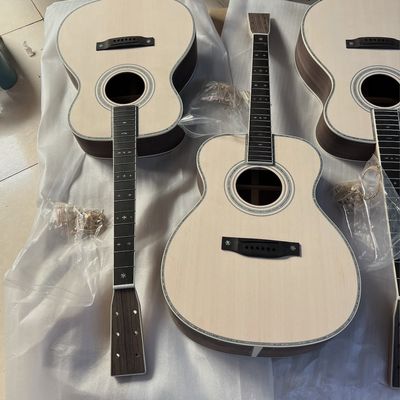 Custom Solid Spruce Top OM Kits Acoustic Guitar without Finishing, Customized Logo on Headstock proveedor