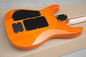 Guitarra eléctrica naranja de fábrica con Floyd Rose, 3 pastillas, sin incrustación de trastes, hardware de oro, chapa de arce de llama proveedor