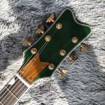 Guitarra eléctrica de jazz con cuerpo semi hueco con Bigsby Tremolo en color verde proveedor