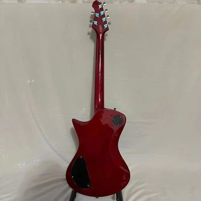 Personalizado Ernie Ball Music Man Armada Dividido Guitarra eléctrica de color rojo en forma de V Bookmatched Flame Maple Top HH Humbucking proveedor