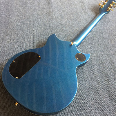 Guitarra eléctrica personalizada en azul metálico con hardware dorado proveedor