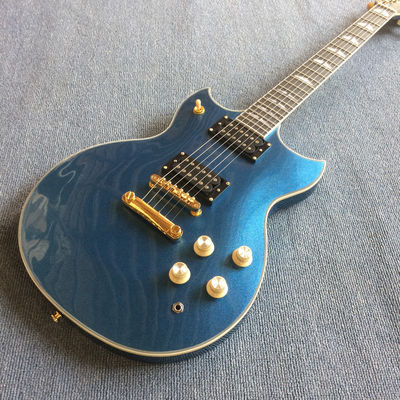 Guitarra eléctrica personalizada en azul metálico con hardware dorado proveedor