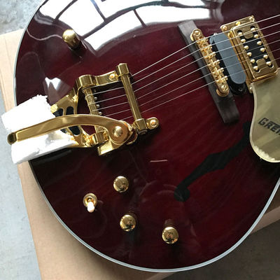 Guitarra eléctrica de doble superficie convexa personalizada Big Tremolo en vino rojo proveedor