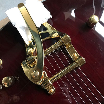 Guitarra eléctrica de doble superficie convexa personalizada Big Tremolo en vino rojo proveedor