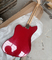 Guitarra eléctrica de 6 cuerdas en rojo metálico proveedor