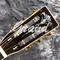 Guitarra acústica de estilo OM de 40 pulgadas de cedro sólido con tablero de dedos de ébano proveedor